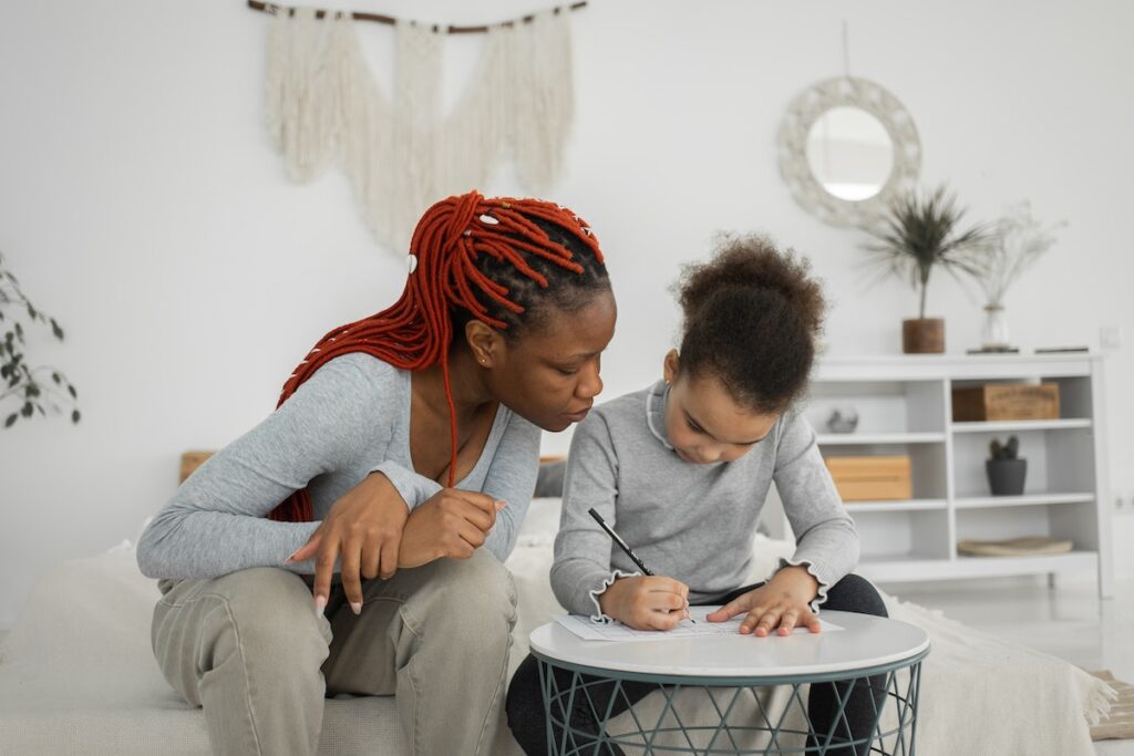 Parent studying with child: Homeschooling in Kenya: All You Need To Know